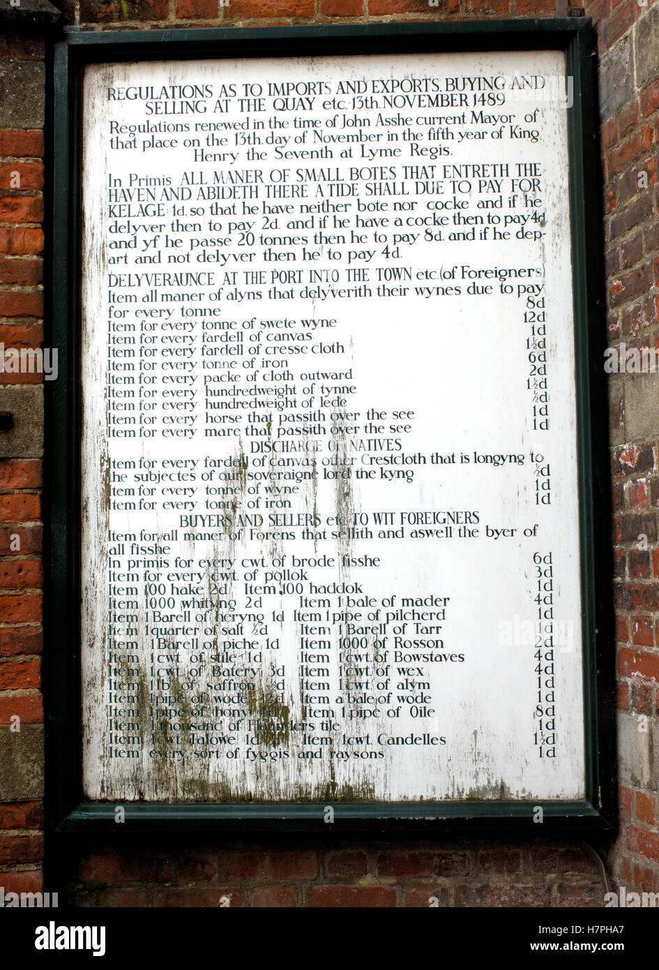 Public notice setting out the regulations re imports and exports at the Quay, Lyme Regis, Dorset, England, UK Stock Photo