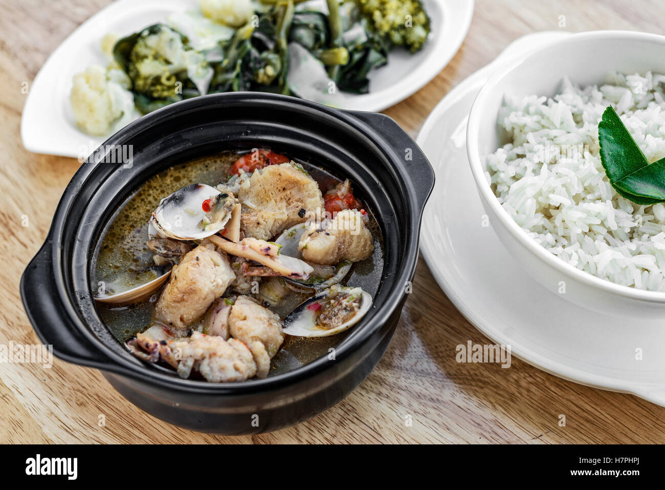 traditional fish clams and mixed seafood portuguese caldeirada de peixe spicy soup stew meal Stock Photo