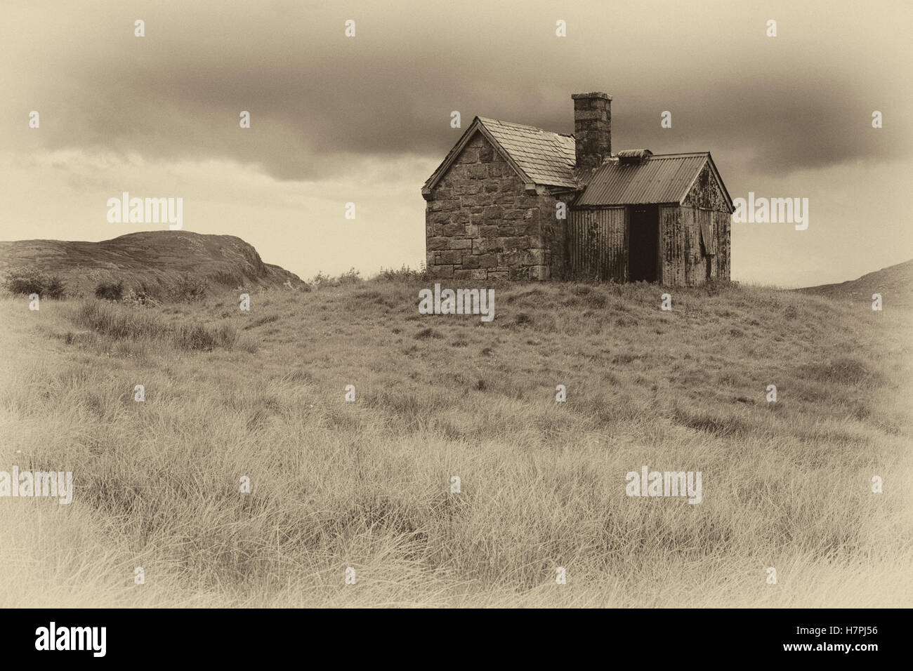 Abandoned dilapidated crofters cottage at Elphin Sutherland West Coast of Scotland Stock Photo