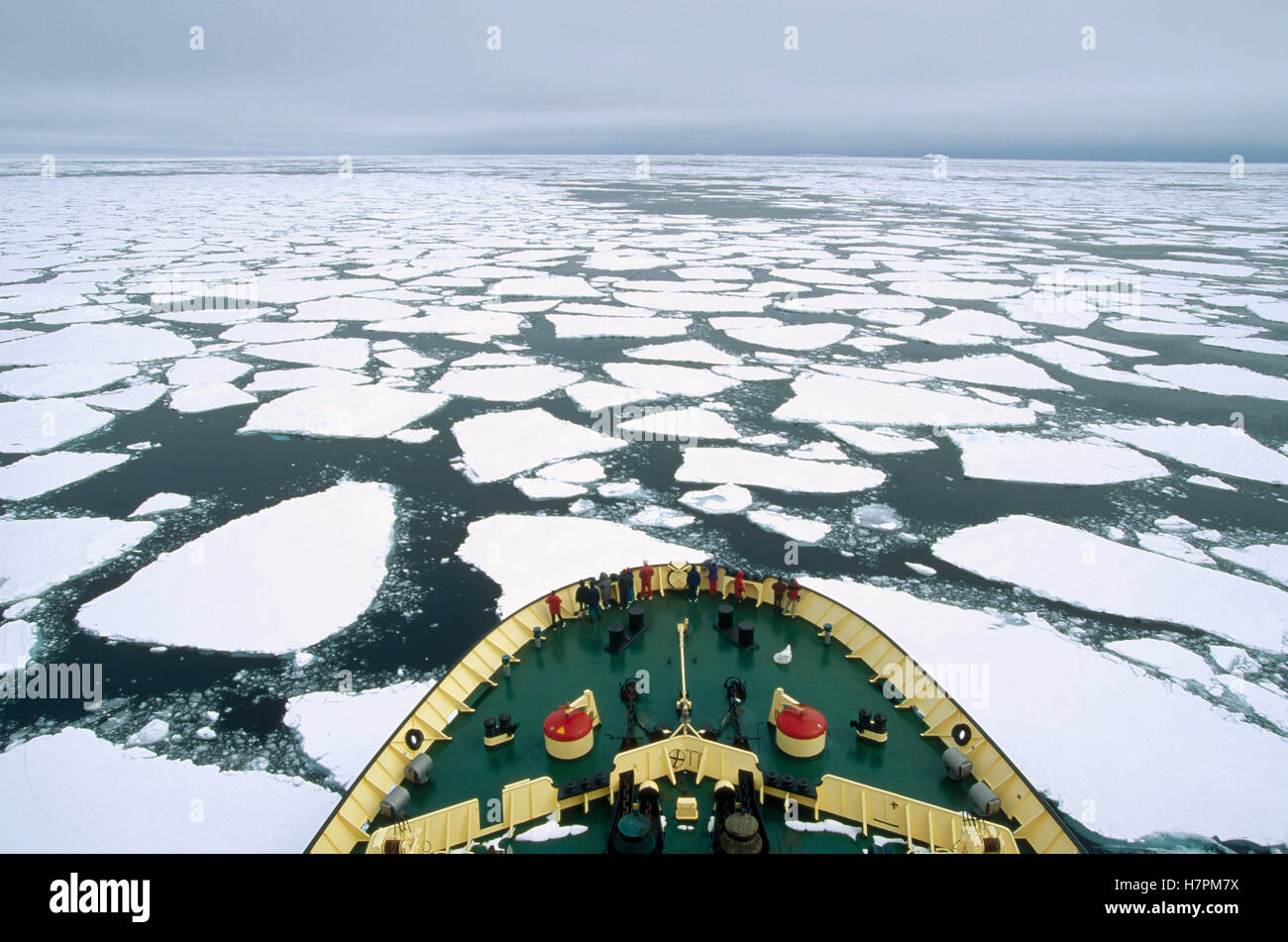 Tourists on Russian icebreaker breaking through pack ice, Antarctica Stock Photo
