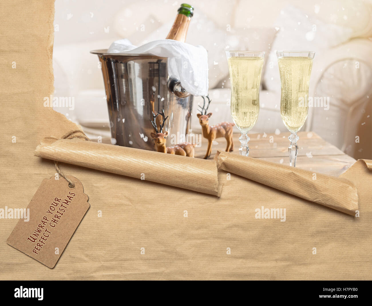 Torn paper with label revealing Christmas champagne Stock Photo