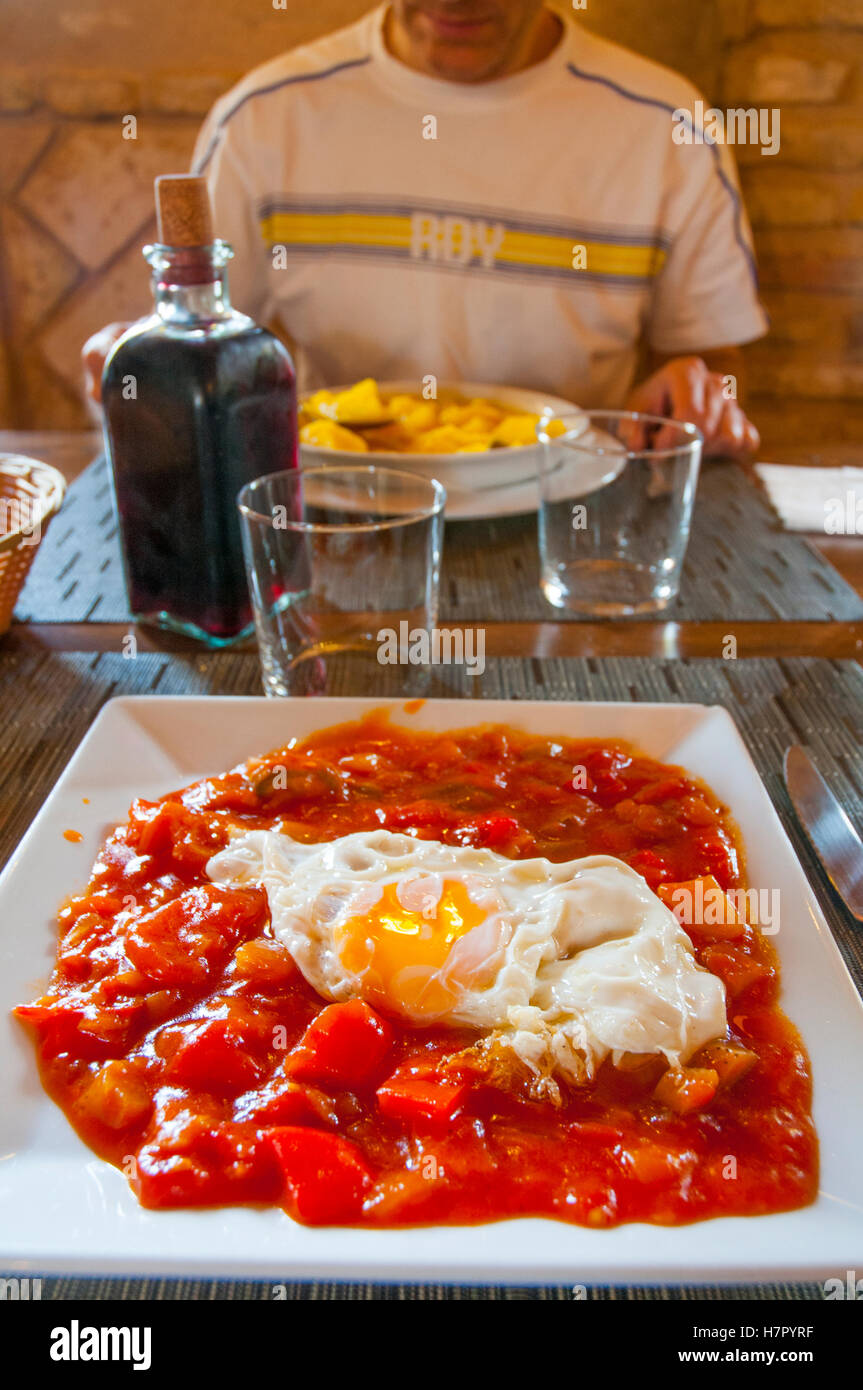 Pisto manchego serving in a restaurant. Spain. Stock Photo