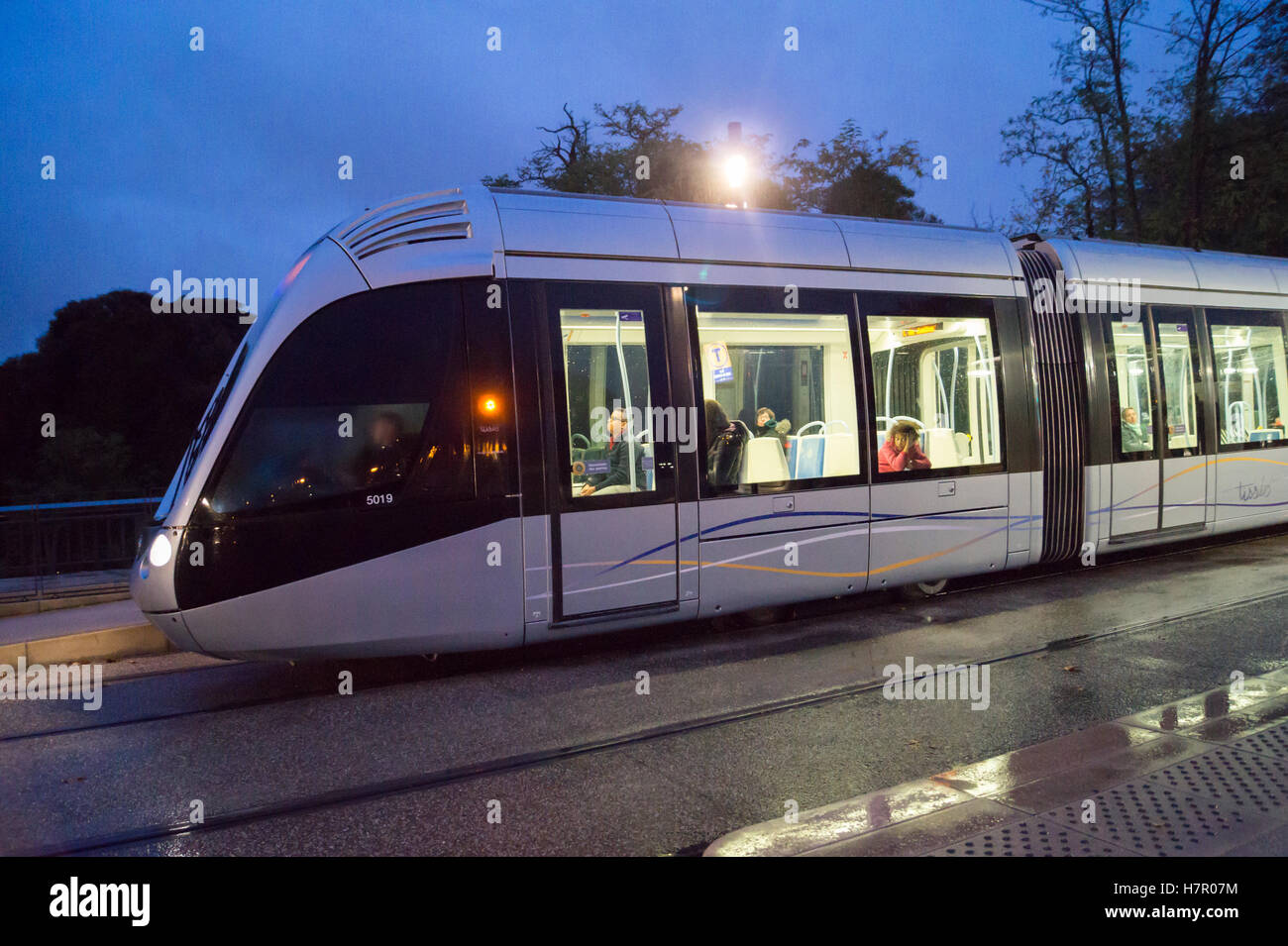 Tram car at night at Ile du Ramier stop in Toulouse, Haute-Garonne, Occitanie, France Stock Photo