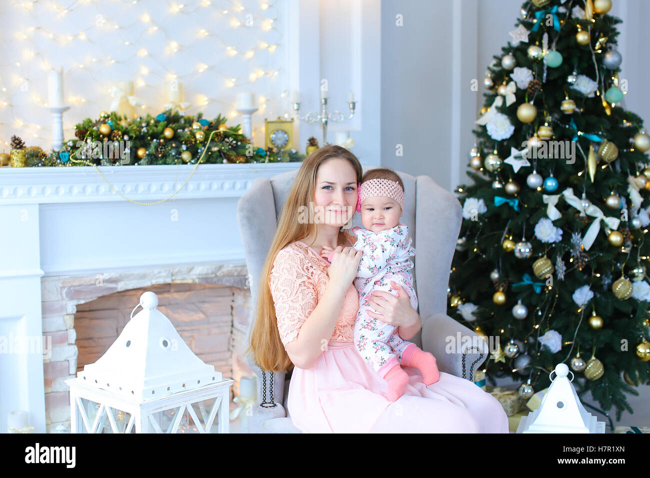 Mother and daughter communicate and smile at each other, sitting in