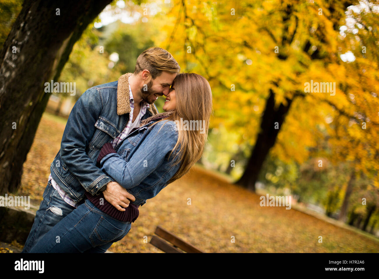 Loving couple in the autumn park Stock Photo - Alamy