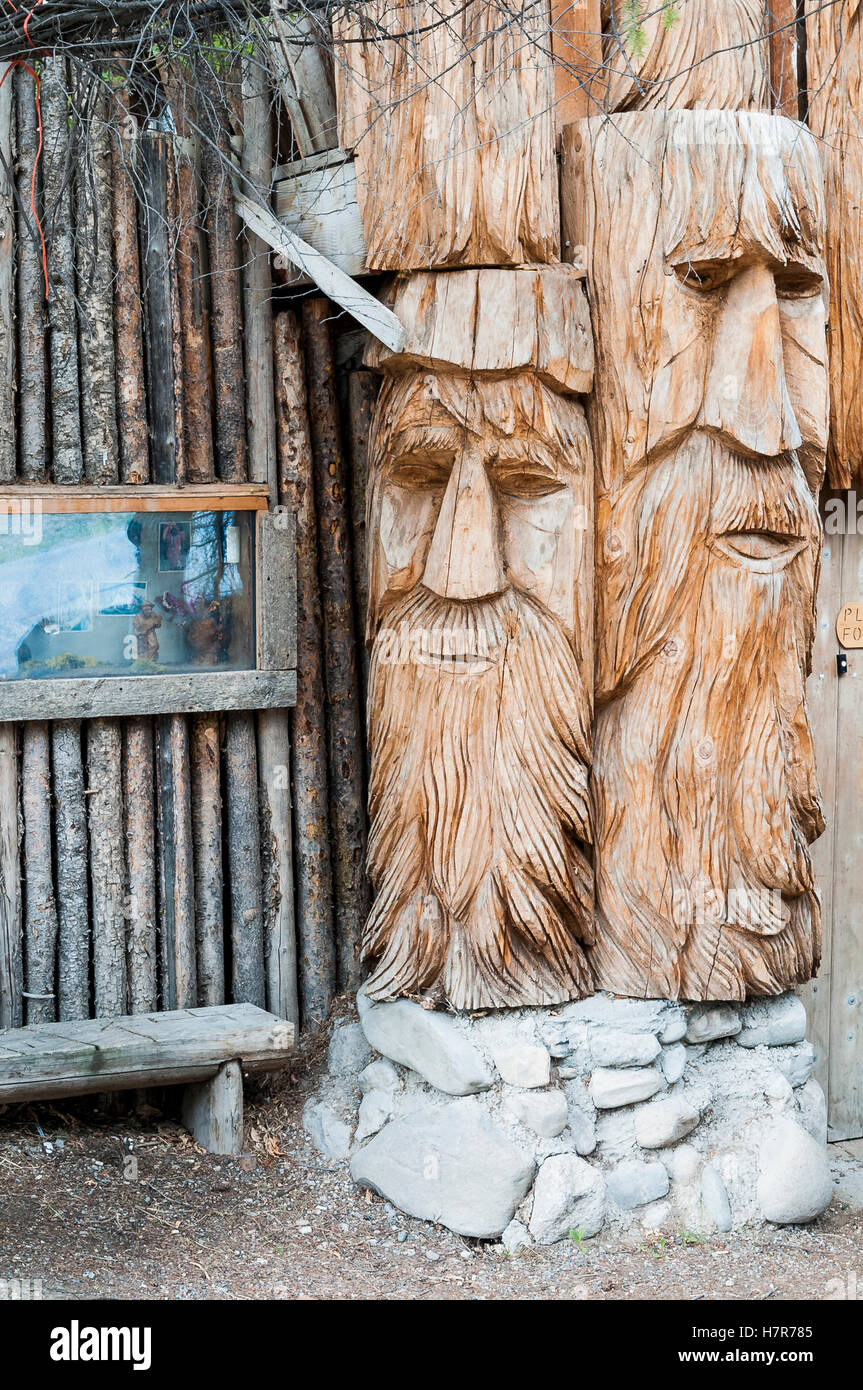 Chainsaw artist Rolf Heer´s ´Home of a Thousand Faces´ Radium Hot Springs, British Columbia, Canada. Stock Photo