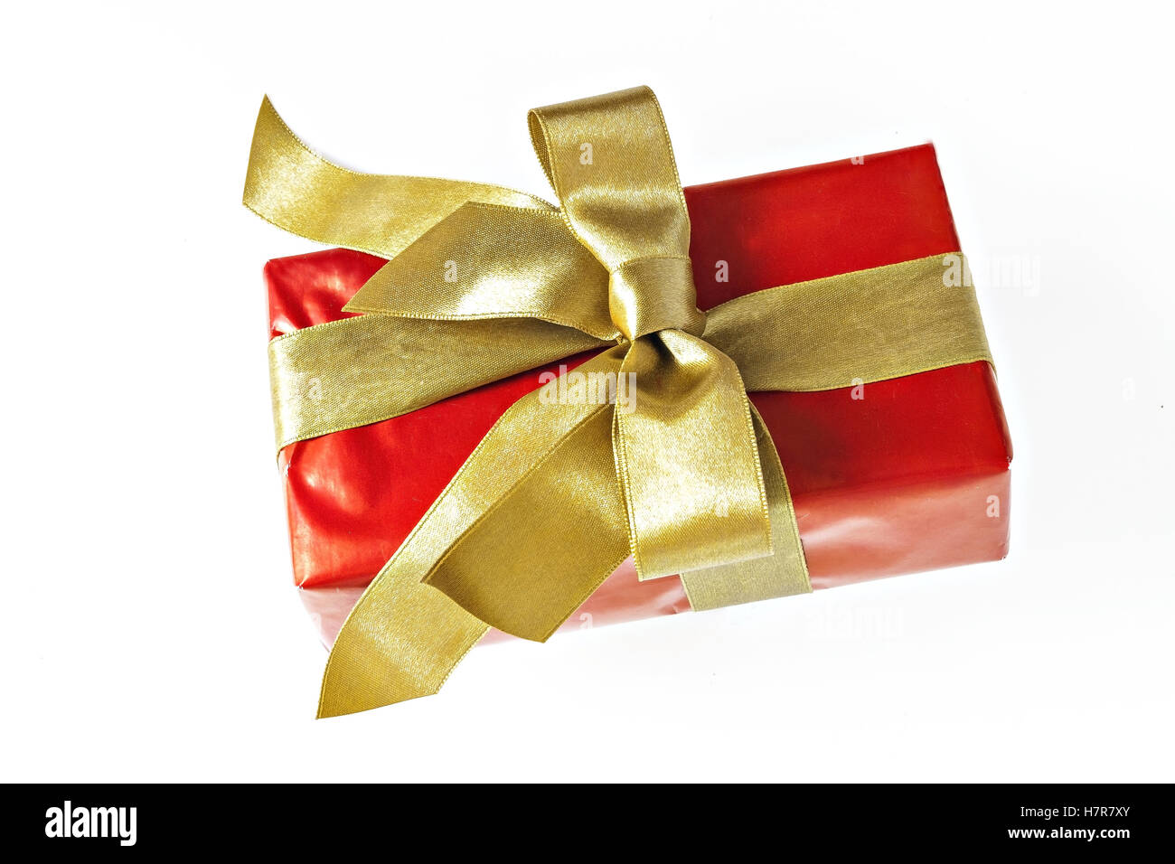 Gift red box with gold ribbon and bow isolated Stock Photo - Alamy