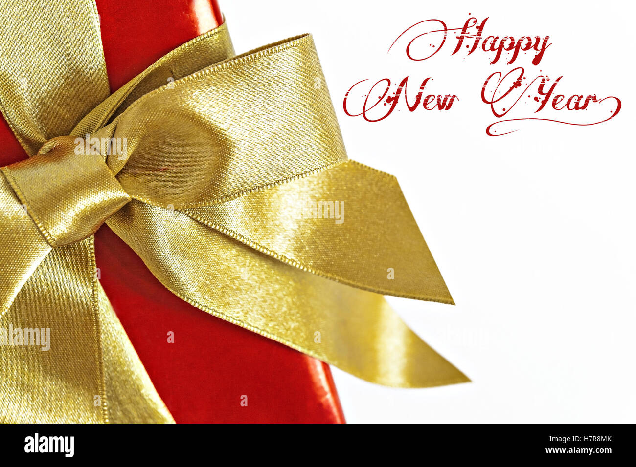 Gift red box with gold ribbon and text isolated Stock Photo - Alamy