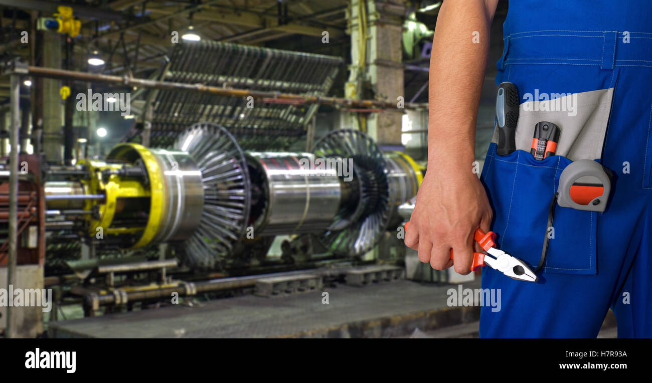 Worker with instruments Stock Photo - Alamy