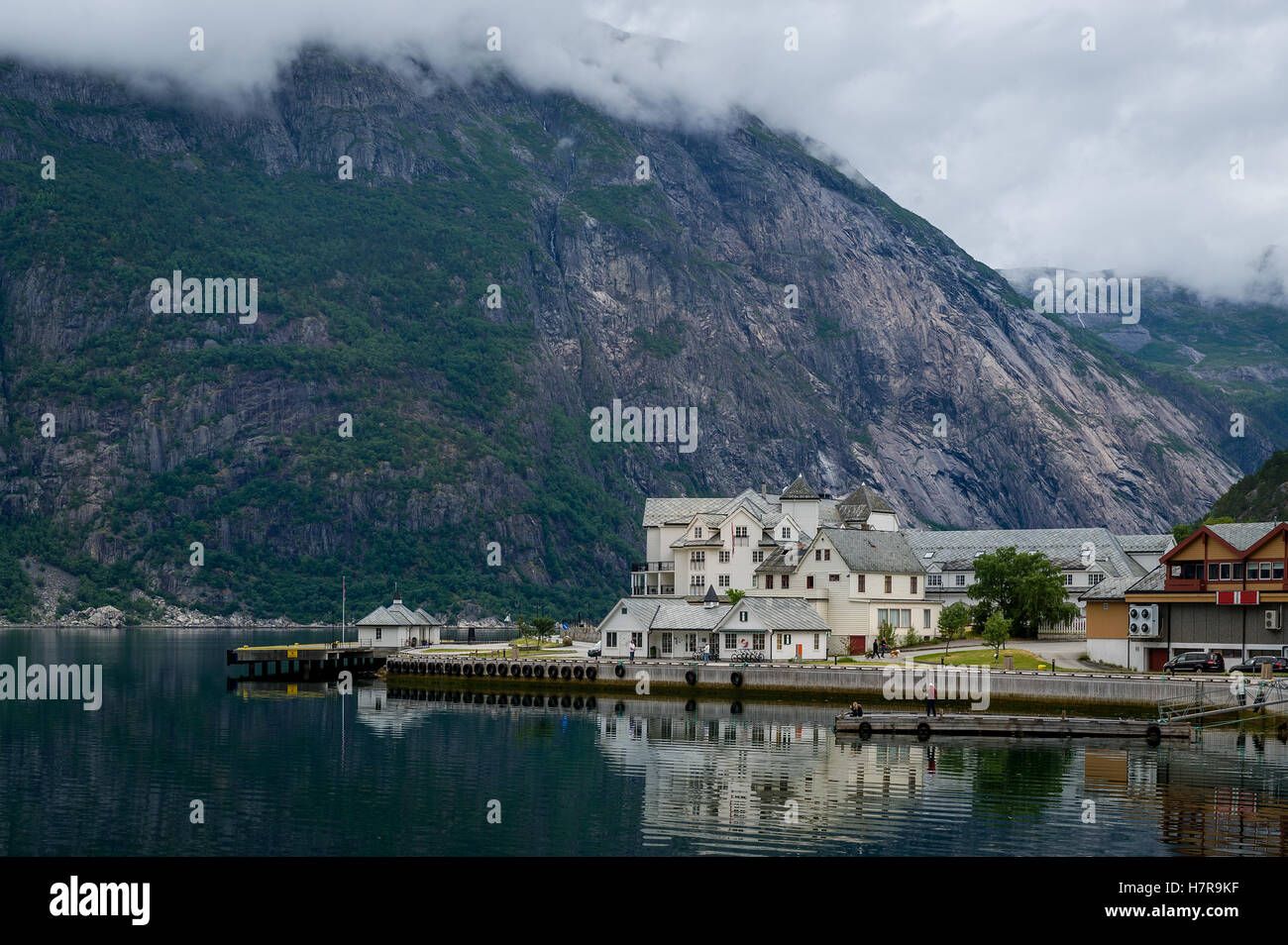 Norwegian fjord town and mountain a background. Norway. Stock Photo