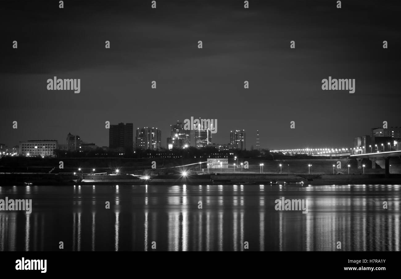 Reflection lights of the night city in a big river Stock Photo - Alamy