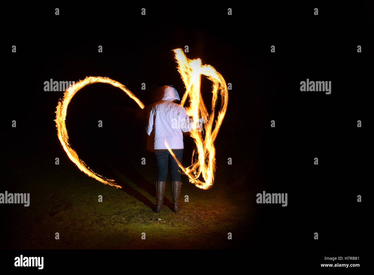 Spinning Fire Poi Stock Photo