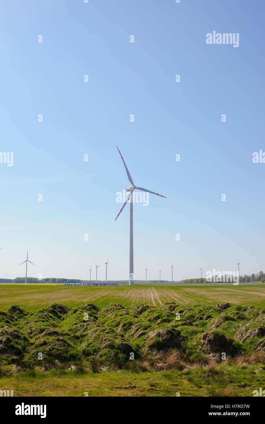 Bright blue sky moving and wind turbine Stock Photo - Alamy