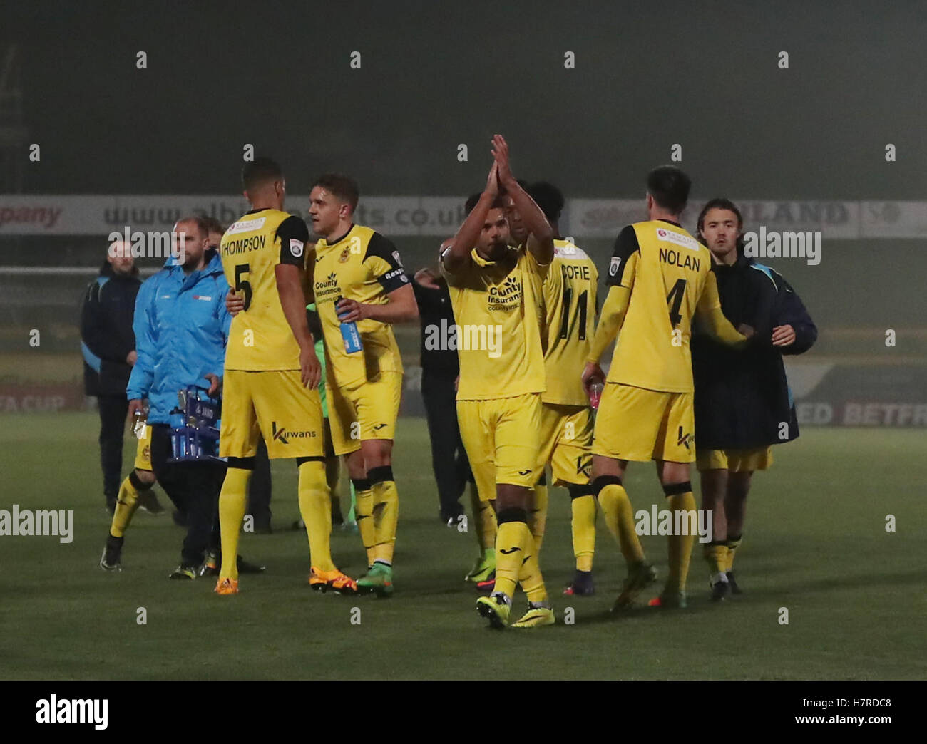 Southport players congratulate each other after the Emirates FA Cup, First Round match at the Merseyrail Community Stadium, Southport. Stock Photo