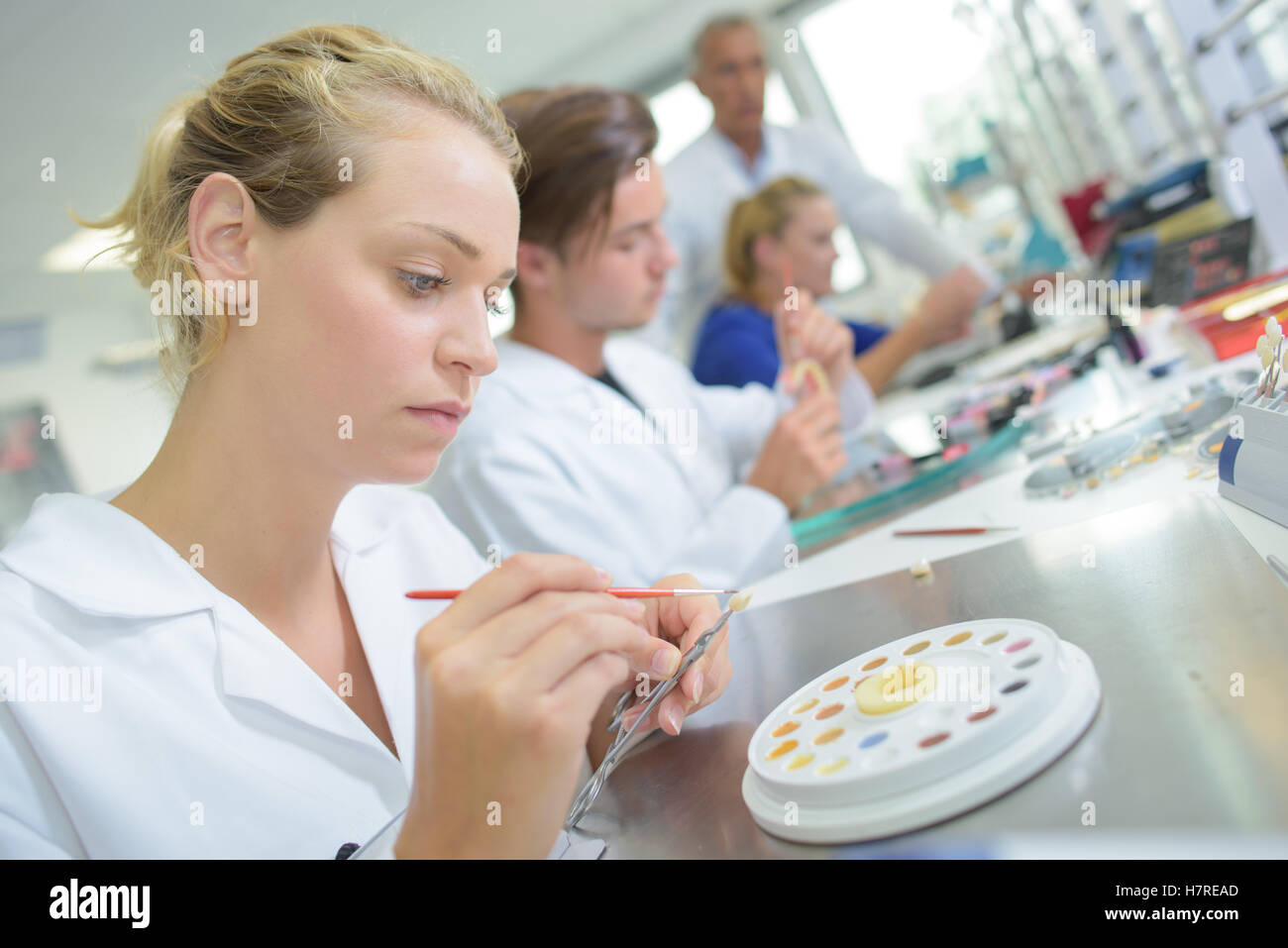 Female technician working in a dentures laboratory Stock Photo Alamy