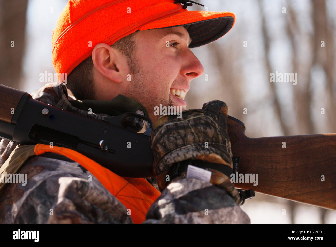 Winter Pheasant Hunter With Shotgun On Shoulder Stock Photo