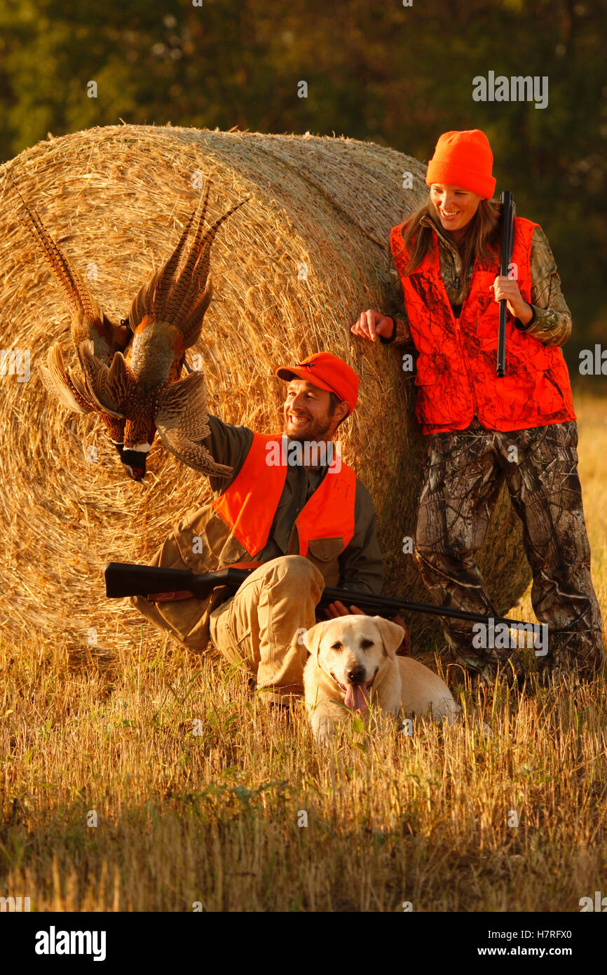 Male And Female Pheasant Hunters Stock Photo