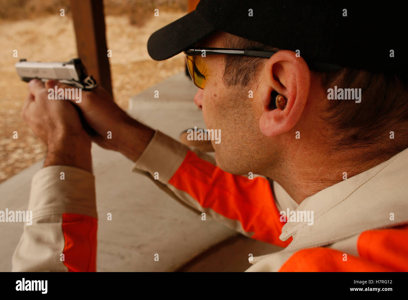 Handgun Range Shooting With Hearing Protection Stock Photo Alamy