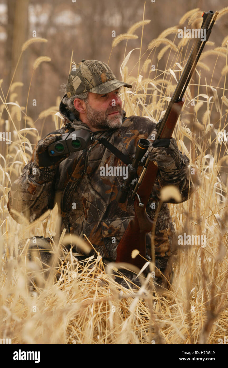 Deer Hunter With Muzzleloader In The Field Stock Photo