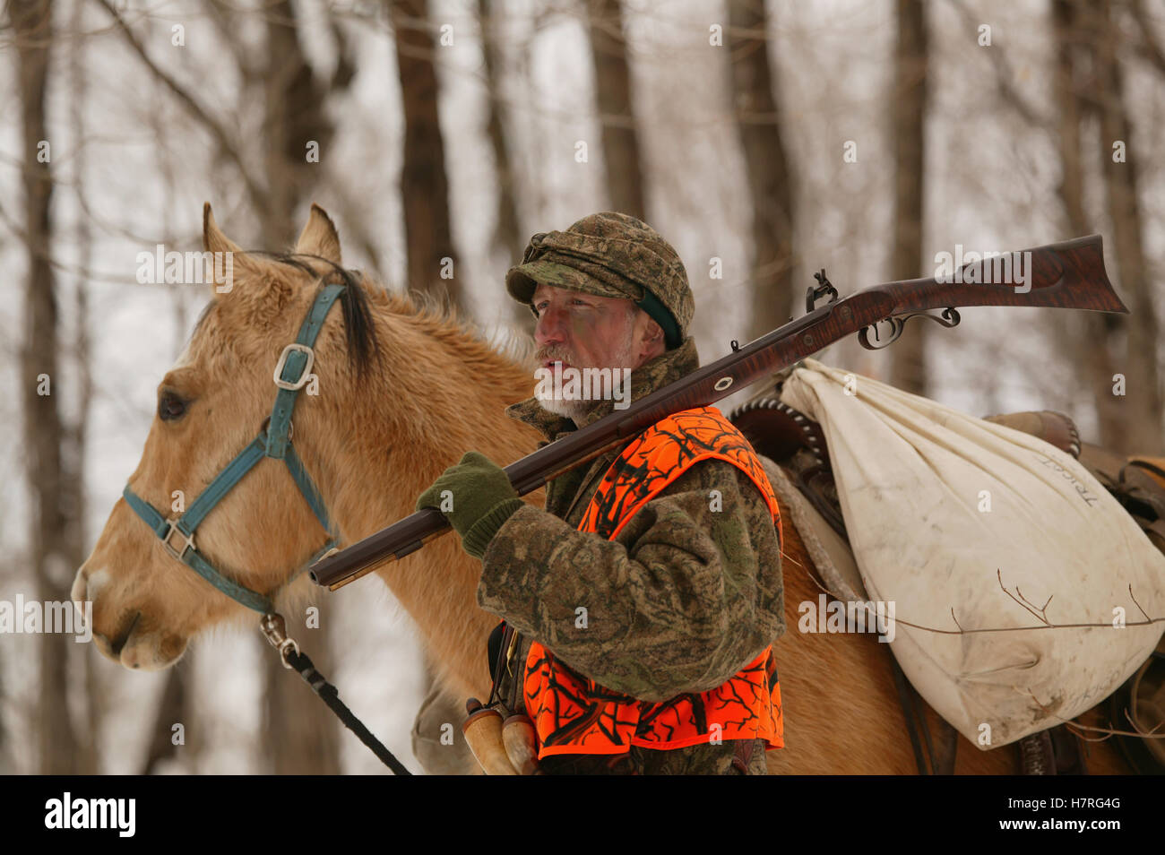 Muzzleloader Hunter With Horse Hunting In Winter Stock Photo Alamy