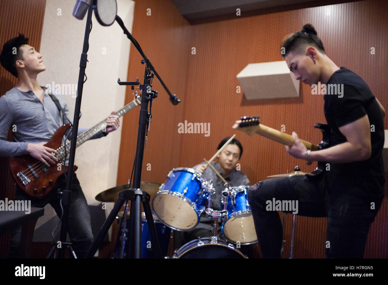 Chinese musical band in recording studio Stock Photo Alamy