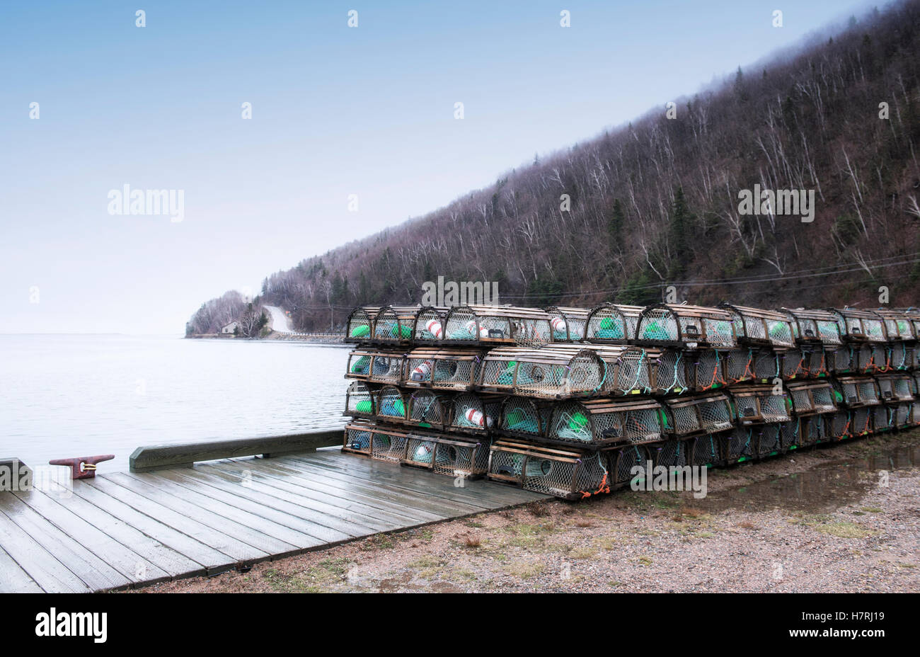 Lobster traps stacked in parking lot/dock along the Cabot Trail; Nova