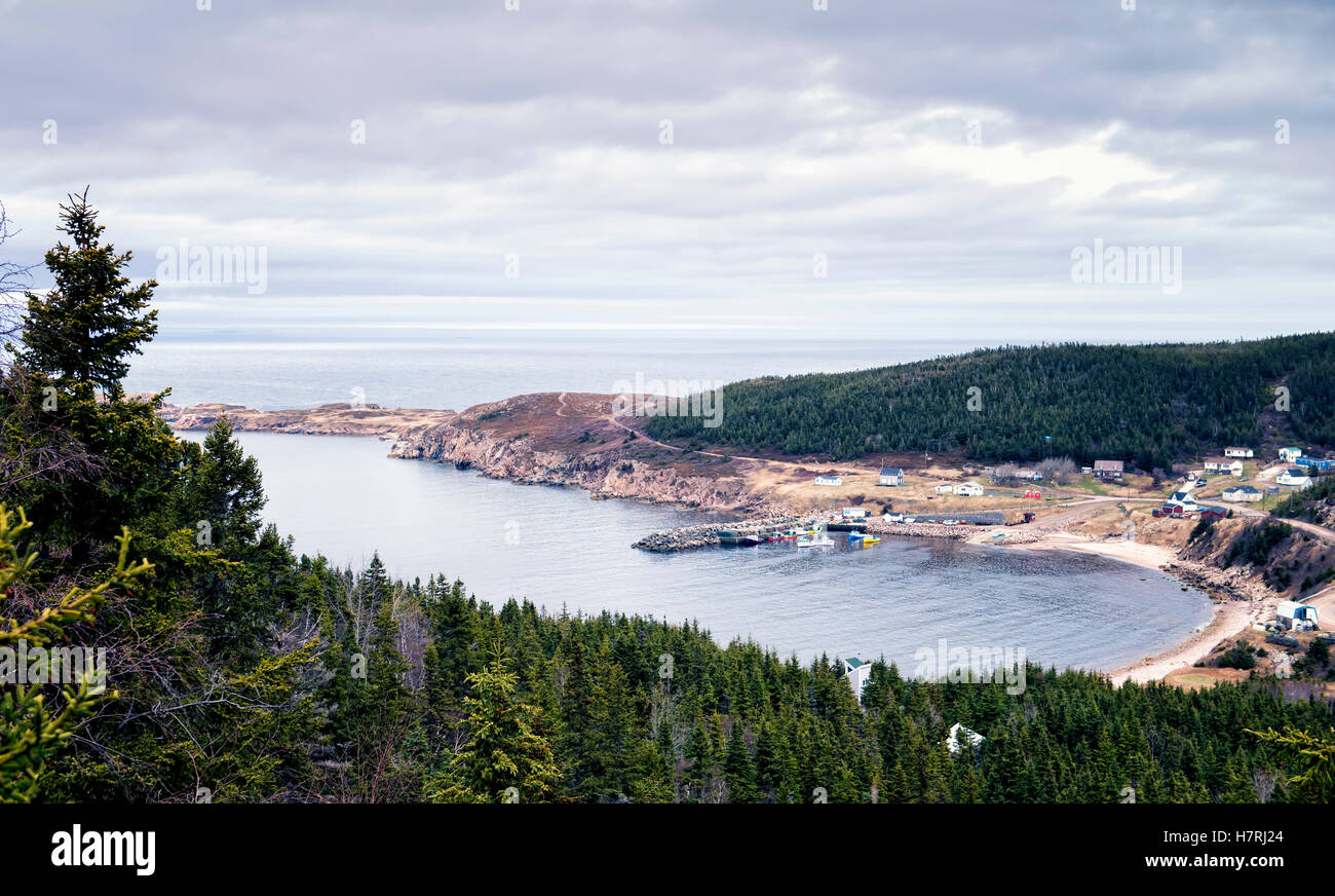 High view of a cove with beach and harbour along the Canadian atlantic coast; White Point, Nova Scotia, Canada Stock Photo