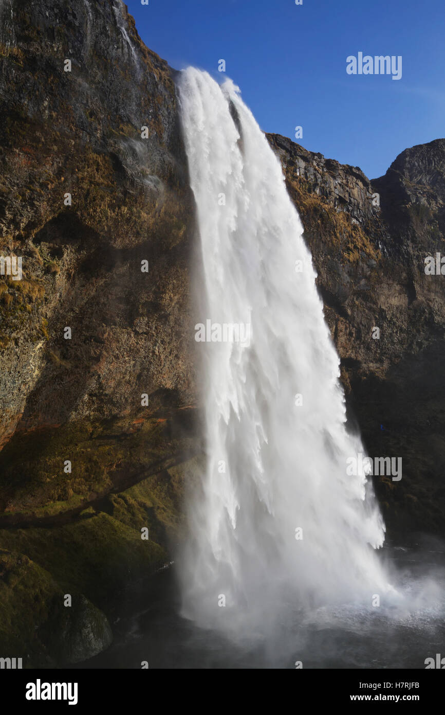 Waterfall cascading down a mountainside Stock Photo - Alamy