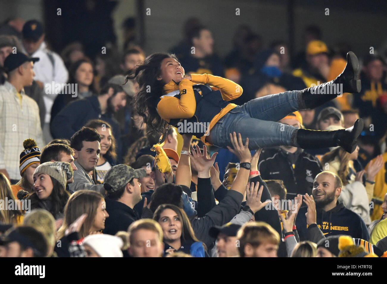 Morgantown, West Virginia, USA. 5th Nov, 2016. A WVU fan crowd surfs after a touchdown during a game played at Mountaineer Field in Morgantown, WV. WVU beat Kansas 48-21. © Ken Inness/ZUMA Wire/Alamy Live News Stock Photo