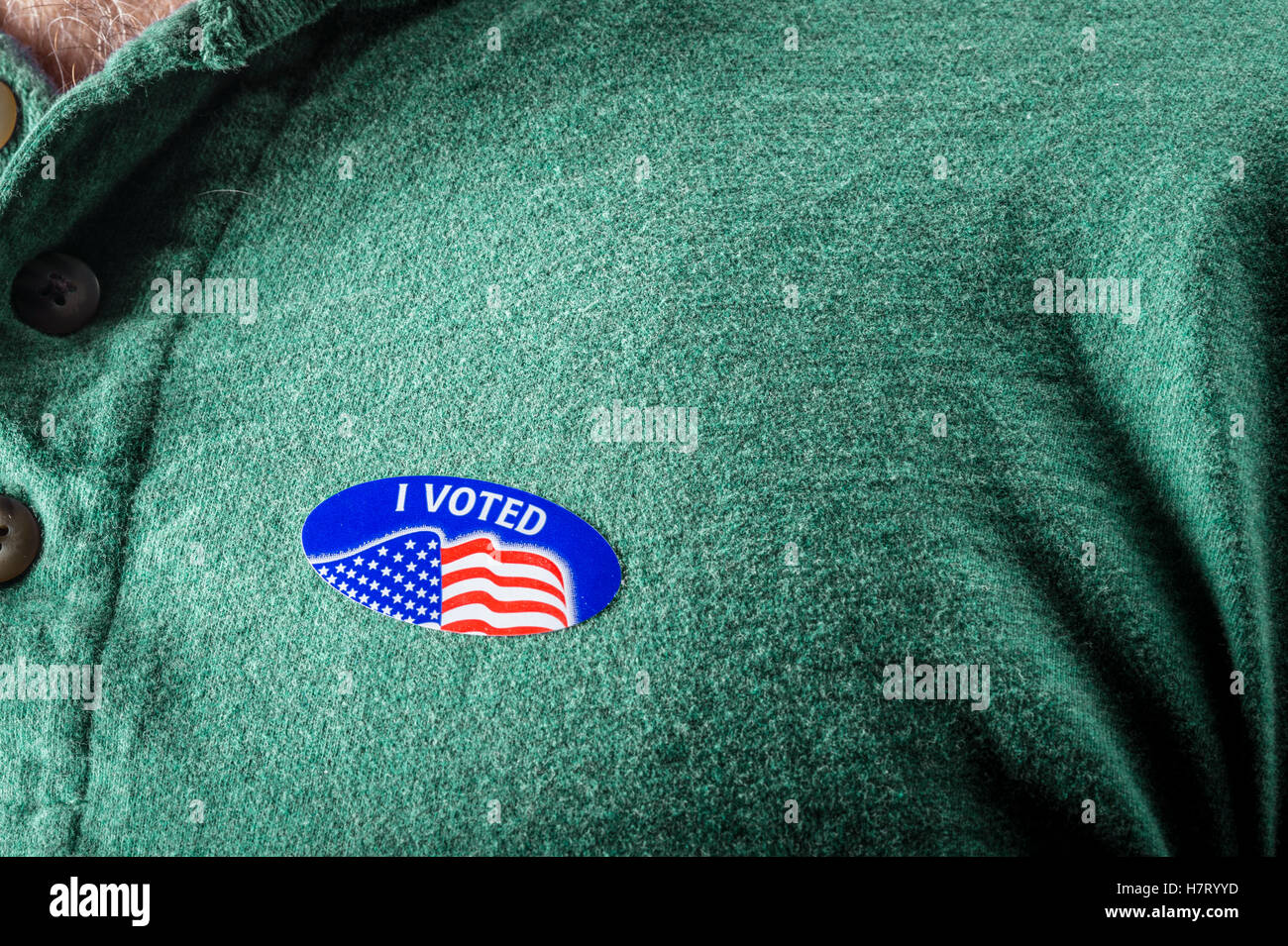 Detail of I Voted sticker on man's chest Stock Photo