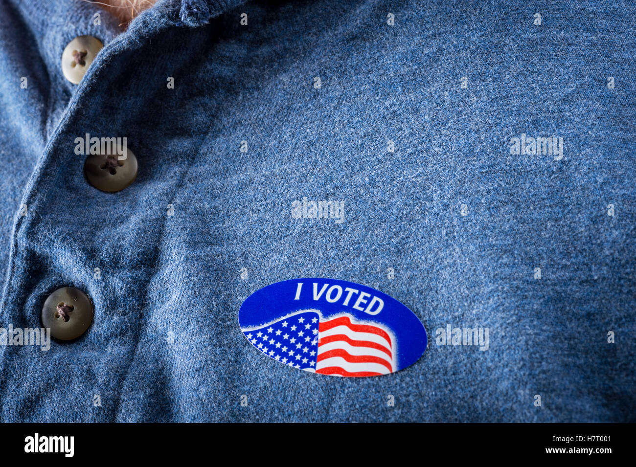 Detail of I Voted sticker on man's chest Stock Photo