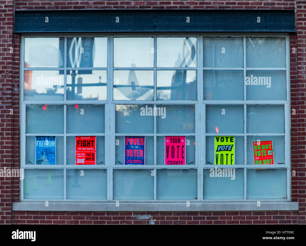 Voting signs in a window on election day. Baltimore, Maryland, USA. 8th ...