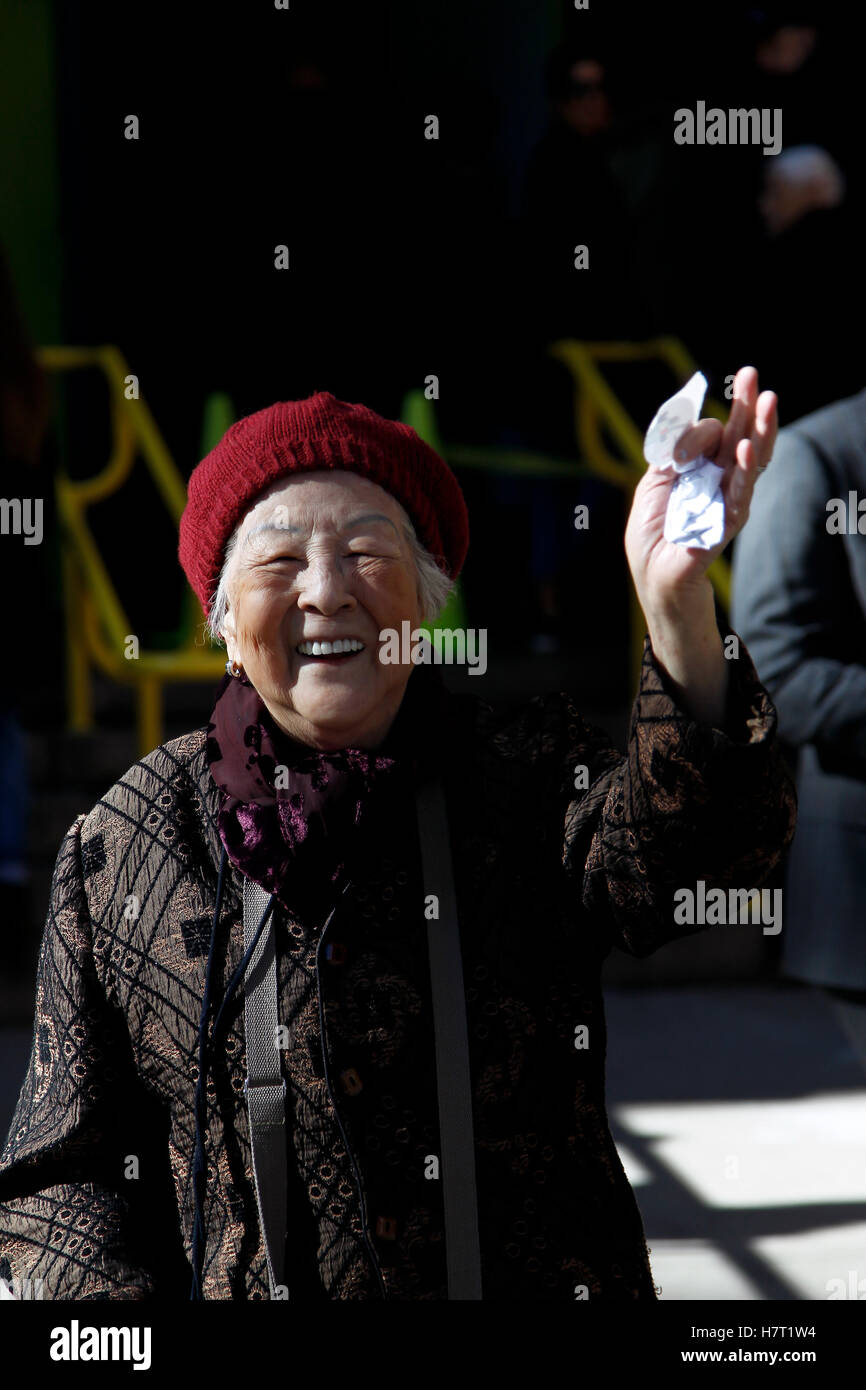 New York, United States. 08th Nov, 2016. An elderly chinese woman holds up a 'just Voted' sticker after casting her ballot in the Chelsea neighborhood of Manhattan in New York City on Election Day, November 8, 2016. Record numbers of voters are turning our for the historic United States Presidential election between Hilary Clinton and Donald Trump. Credit:  Adam Stoltman/Alamy Live News Stock Photo