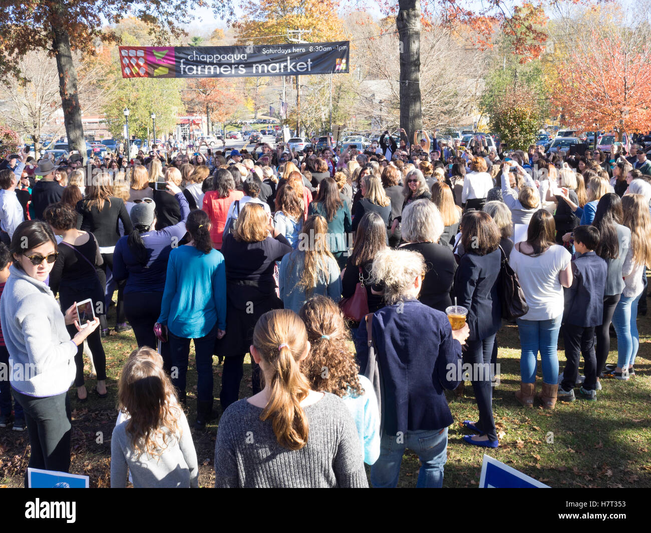 Chappaqua, NY, USA - 8 November 2016. Crowds gather in presidential candidate Secretary of State Hillary Clinton's home town of Chappaqua, New York for a Pantsuit Up flash mob at the Chappaqua Train Station on Election Day. Credit:  Marianne A. Campolongo/Alamy Live News Stock Photo
