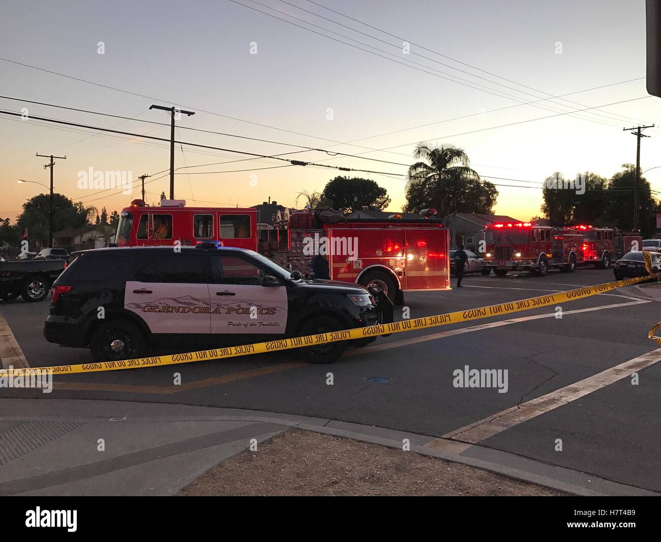 Asuza, USA. 8th Nov, 2016. Police cars and fire trucks gather at the site of shooting near a polling station in Asuza, California, the United States, on Nov. 8, 2016. One person was killed and two others were critically injured in the shooting incident outside a polling location in Asuza, police said. Credit:  Huang Chao/Xinhua/Alamy Live News Stock Photo