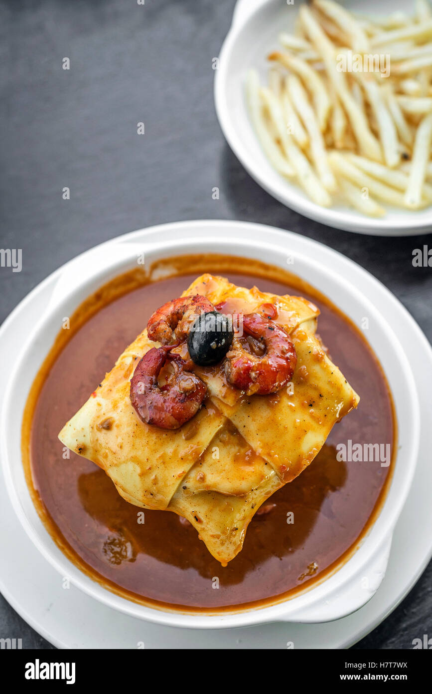 Famous Francesinha Traditional Meat Cheese And Spicy Sauce Grilled famous-francesinha-traditional-meat-cheese-and-spicy-sauce-grilled