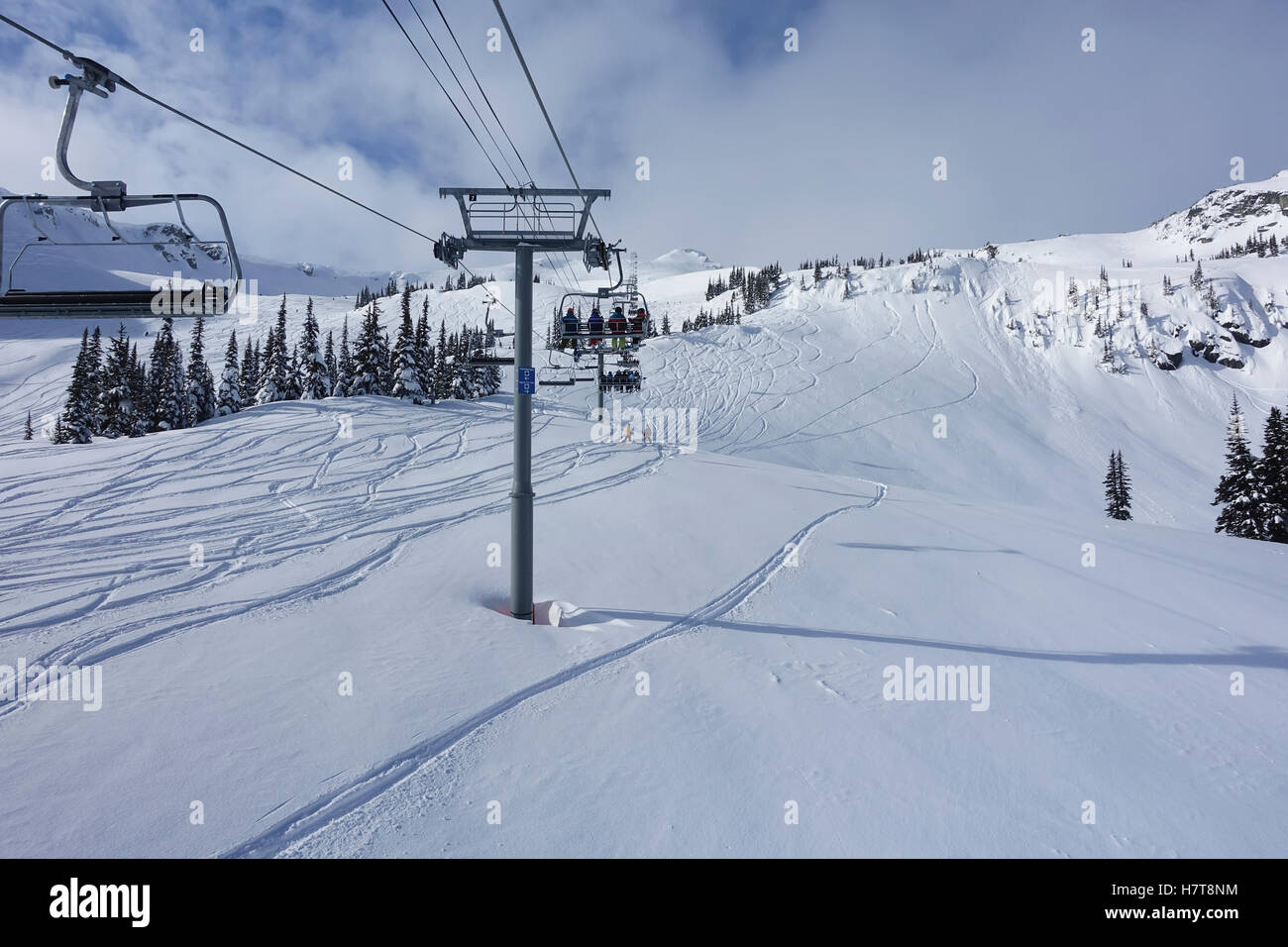 Going up on the Harmony Chairlift to ski hill; Whistler, British Columbia, Canada Stock Photo