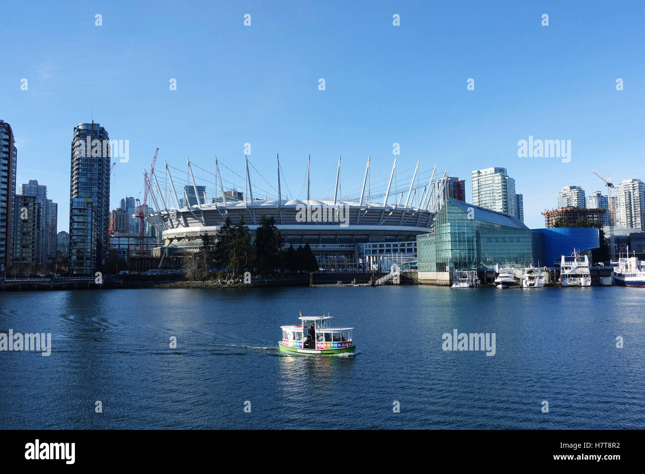 Aquabus passing BC Place; Vancouver, British Columbia, Canada Stock Photo