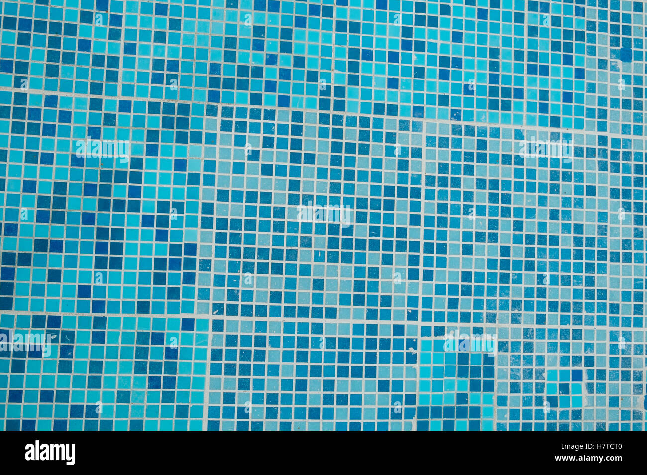 Full frame take of a blue tiled swimming pool Stock Photo - Alamy