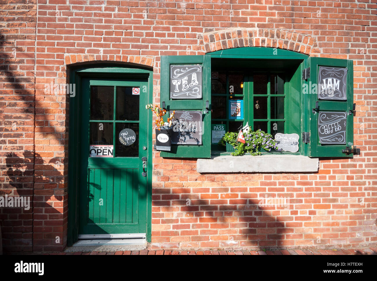 A small outdoor cafe in the popular Distillery district, a  tourist and residential area Toronto Ontario Canada Stock Photo