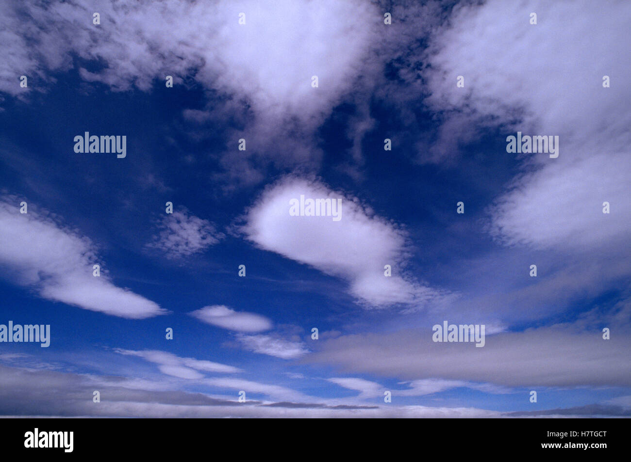 Altocumulus clouds and blue sky Stock Photo - Alamy