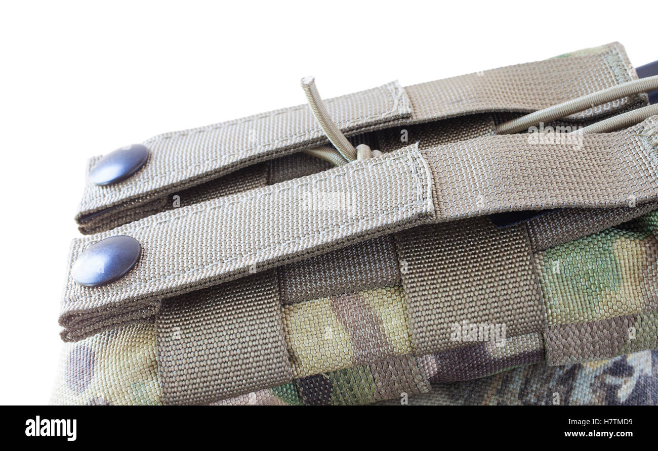 Strap and metal clasps used to attach a Ar-15 magazine pouch to webbing Stock Photo