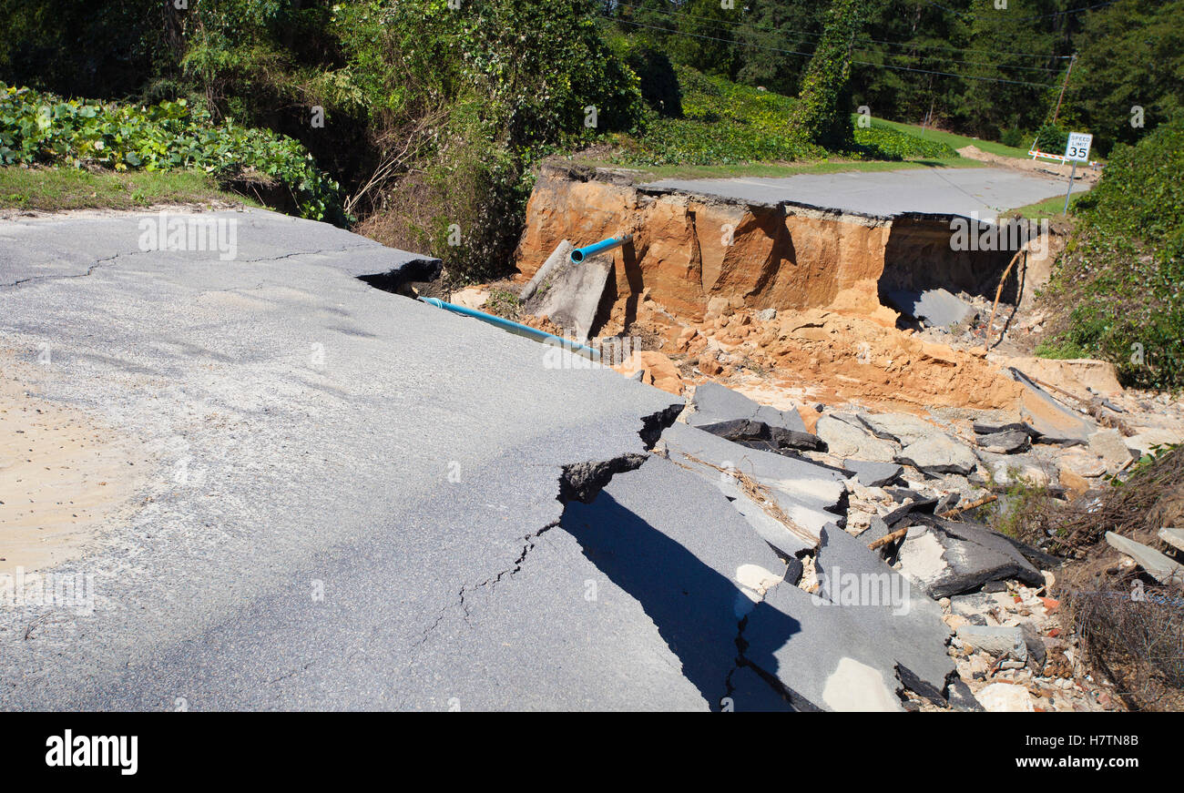 Road and pipes underneath washed away near Raeford North Carolina by