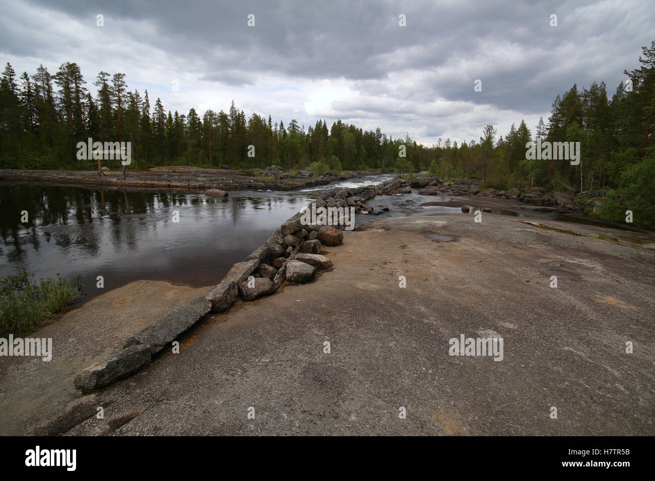 Swedish river in Haelsingland with rock ground. Stock Photo