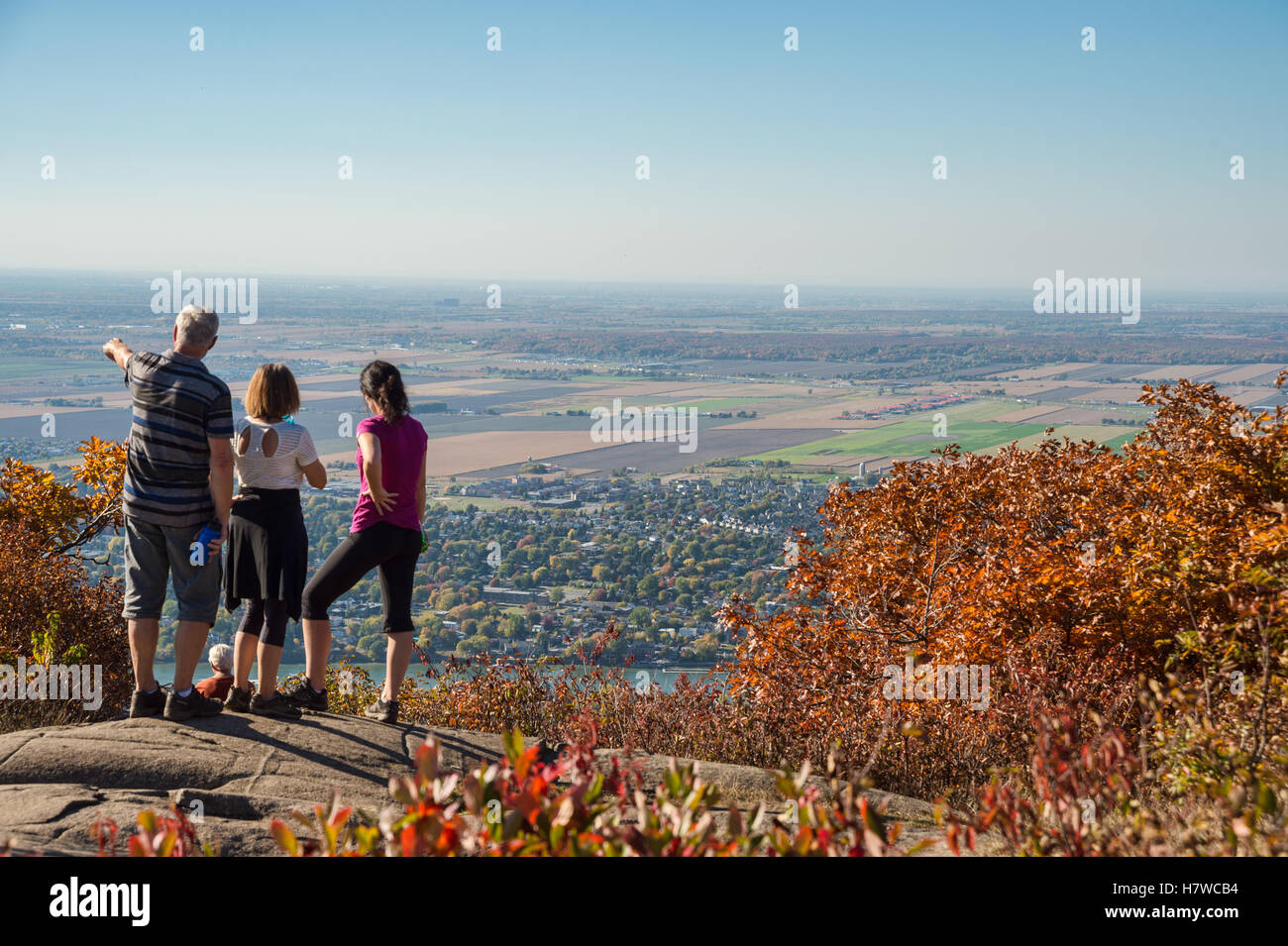 Trekkers at the top of Dieppe cliff on Mont SaintHilaire in Quebec