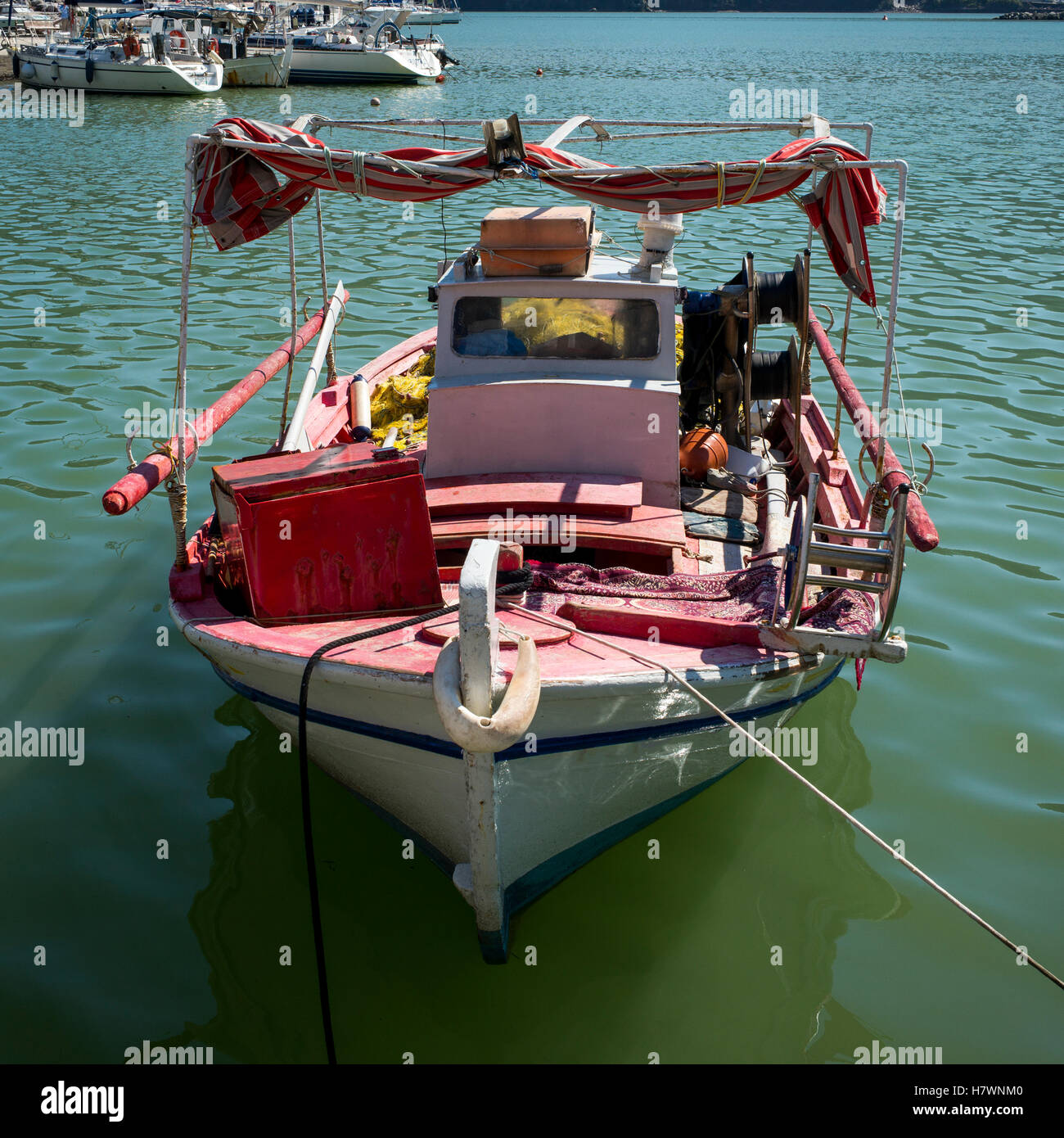 A fishing boat in a harbour; Skopelos Town, Skiathos, Greece Stock Photo