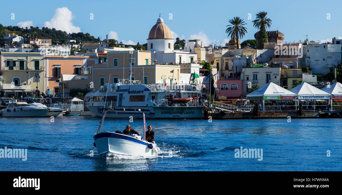 Boating in the harbour off the coast of Ischia; Ischia, Campania, Italy Stock Photo