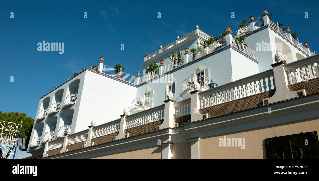 A building with tiered balconies against a blue sky; Lacco Ameno, Ischia, Campania, Italy Stock Photo