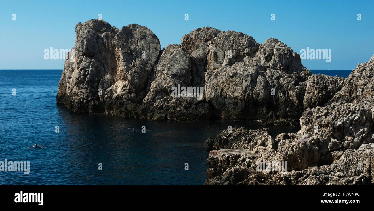 Rugged cliffs along the coastline of the island of Capri; Capri, Campania, Italy Stock Photo