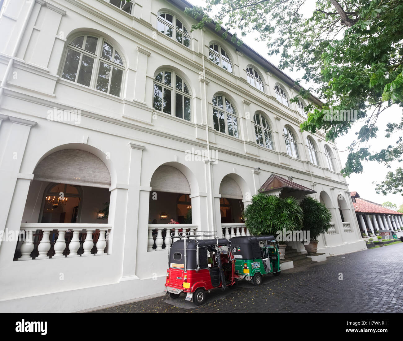 Amangala hotel in colonial era building with auto rickshaw Stock Photo ...